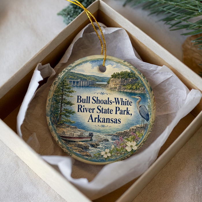 A decorative ornament in a white box, featuring a scenic image of the Bull Shoals-White River State Park in Arkansas.