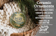 Ceramic ornaments, featuring a round ornament with a scenic image of Burt Lake State Park, Michigan, hanging from a wicker basket.
