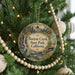 A round ornament hanging on a Christmas tree, featuring a scenic image of a waterfall and pine trees, with the text "Burton Creek State Park, California" displayed prominently.