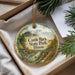 A decorative ornament with a scenic landscape of Castle Rock State Park, Illinois, featuring a river, trees, and a castle.