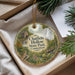 A decorative ornament with a scenic image of Chatfield Hollow State Park, Connecticut, hanging from a string.