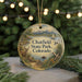 A round ornament with a scenic landscape of Chatfield State Park, Colorado, featuring a deer, a boat, and mountains in the background.