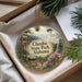 A decorative ornament with a scenic image of Cheaha State Park, Alabama, hanging from a string.