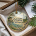 A decorative ornament with a scenic landscape of Cheboygan State Park, Michigan, hanging from a string.