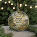 A round ornament with a scenic landscape of Cheney State Park, Kansas, featuring a waterfall and greenery.