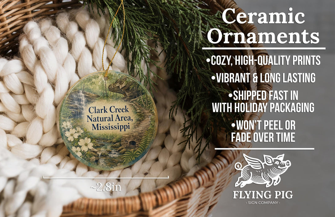 Ceramic ornaments, featuring a detailed image of Clark Creek Natural Area, Mississippi, hanging from a wicker basket.