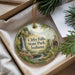 A round ornament with a scenic image of Clifty Falls State Park, Indiana, hanging from a string.