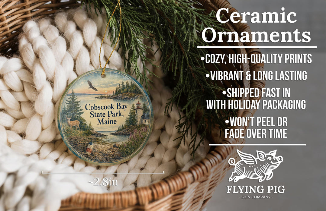 Ceramic ornaments, featuring a scenic image of Cobscook Bay State Park, Maine, hanging from a wicker basket.