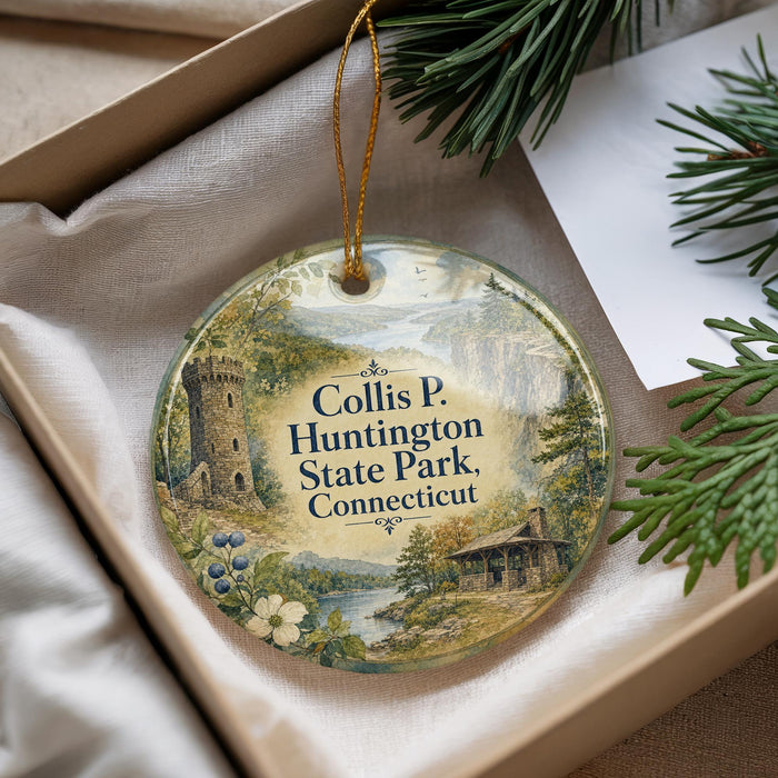A decorative ornament with a scenic landscape of huntington state park, Connecticut, featuring a castle, trees, and a river.