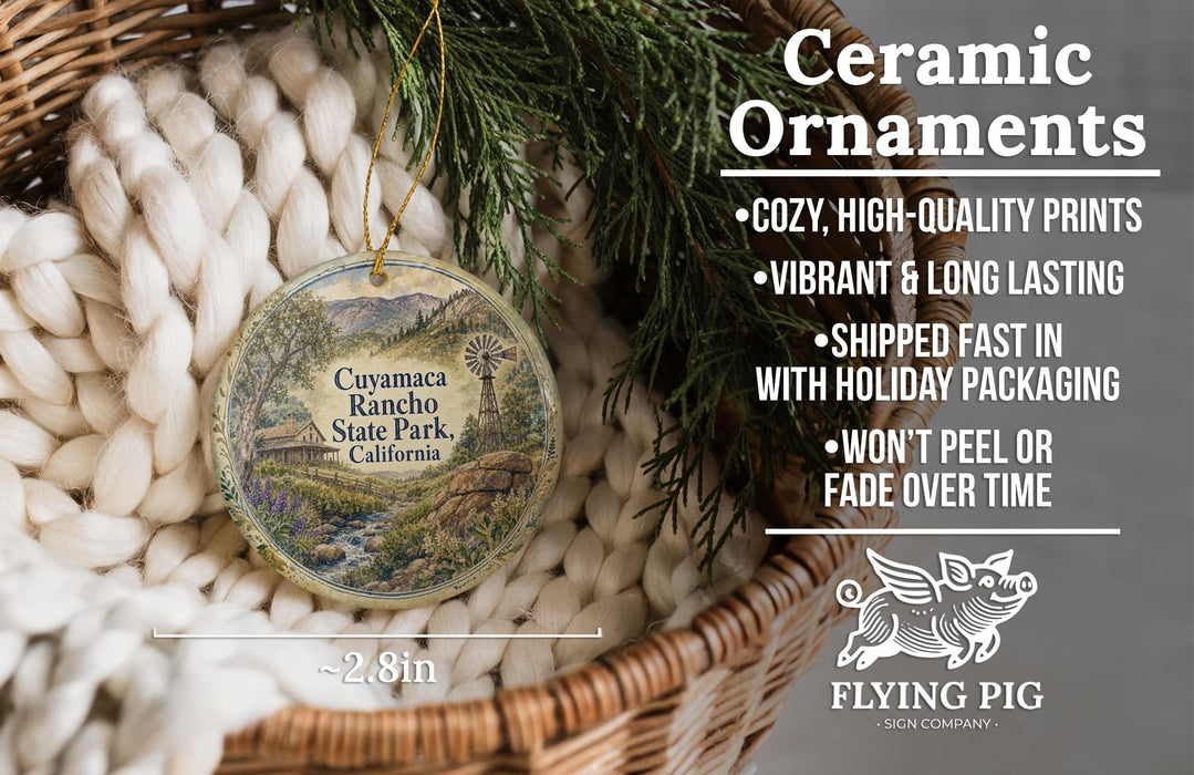 Ceramic ornaments, featuring a detailed image of a scenic landscape, are displayed in a woven basket. The text highlights the ornaments as "Ceramic Ornaments" with a description of their features, including "Cozy, high-quality prints", "Vibrant & long lasting", "Shipped fast in", "with holiday packaging", and "won't peel or fade over time". The image also includes a scale for the ornaments, with the text "2.8in" indicating