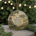 A round ornament with a painting of a rural scene, featuring a house, a barn, and a wagon, along with the text "Dade Battlefield Historic State Park, Florida".