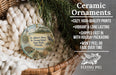 Ceramic ornaments, featuring a lighthouse and a bird, are displayed in a basket with greenery.