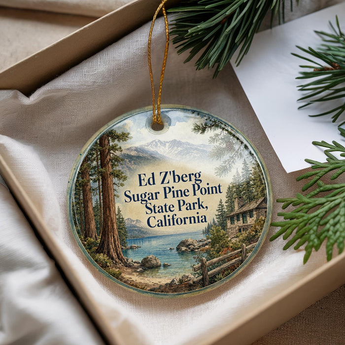 A decorative ornament with a scenic image of Ed Zberg Sugar Pine Point State Park, California, hanging from a string.