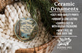 Ceramic ornaments, featuring a scenic image of Sugar Pine Point State Park, California, hanging from a wicker basket.
