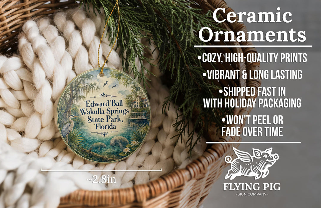 Ceramic ornaments, featuring a round ornament with a scenic image of Edward Ball Wakula Springs State Park, Florida, hanging from a wicker basket.