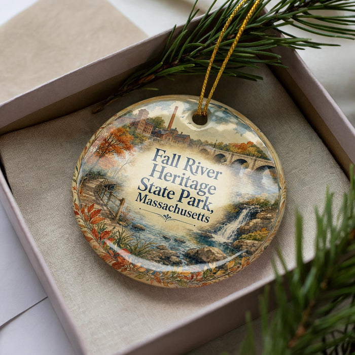 A decorative ornament in a box, featuring a scenic image of Fall River Heritage State Park in Massachusetts.