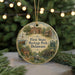 A circular ornament with a design depicting scenes from First State Heritage Park, Delaware, surrounded by Christmas lights.