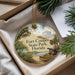 A round ornament with a scenic image of Fort Cooper State Park, Florida, hanging from a string.