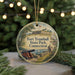 A round ornament featuring a painting of Fort Trumbull State Park in Connecticut, with a cannon and a castle in the background.