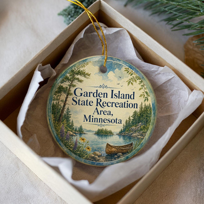 A round ornament with a scenic landscape of a lake, canoe, and trees, along with the text "Garden Island State Recreation Area, Minnesota".