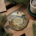 A decorative ornament featuring a scenic landscape of Garrapata State Park, California, with a bridge and pine trees.