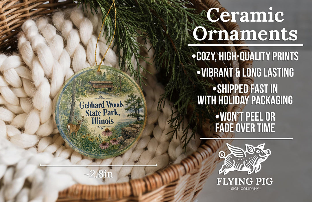 Ceramic ornaments, featuring a detailed image of a forest scene, are displayed in a woven basket.
