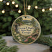 A circular ornament with a scenic landscape of George T. Bagby State Park, Georgia, featuring a waterfall, pine trees, and flowers.