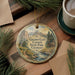 A decorative ornament featuring a scenic landscape of Golden Gate Canyon State Park, Colorado, with a cabin and a stream.