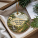 A decorative ornament with a scenic landscape of a waterfall and forest, featuring the text "Gordonia-Alatamaha State Park, Georgia".