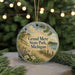 A round ornament with a lighthouse and a scenic landscape, featuring the text "Grand Mere State Park, Michigan" on it.