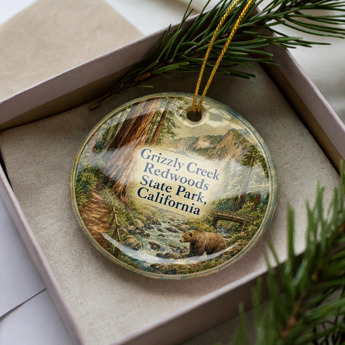 A decorative ornament featuring a scenic image of Grizzly Creek in the Redwoods State Park, California.