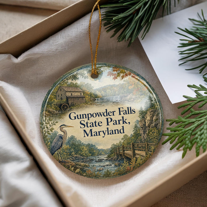 A decorative ornament with a scenic image of Gumpowder Falls State Park, Maryland, hanging from a string.
