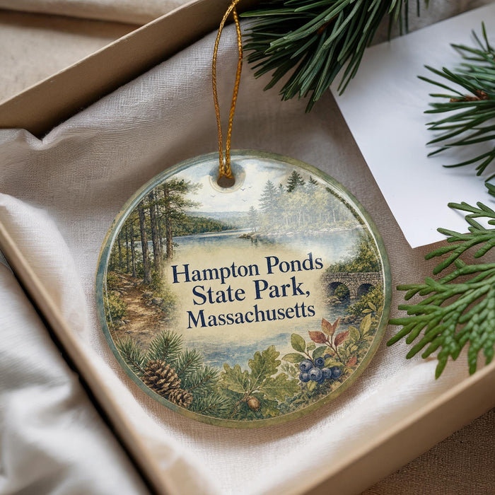 A decorative ornament with a scenic image of a forest and a body of water, along with the text "Hampton Ponds State Park, Massachusetts".
