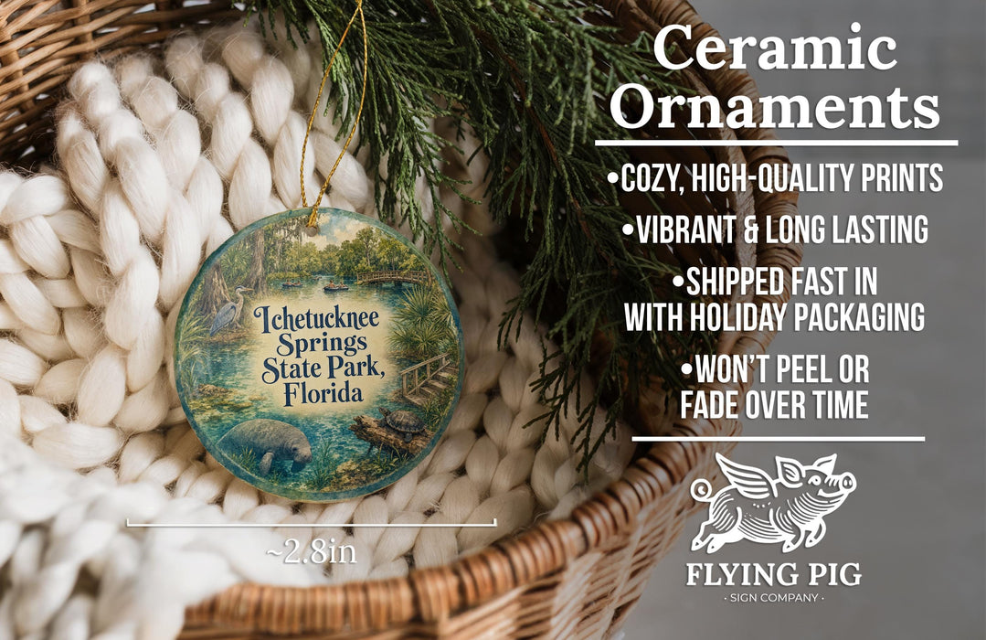 Ceramic ornaments, featuring a detailed image of a manatee in a pond, are displayed in a woven basket.