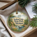 A decorative ornament with a scenic image of Indian Lake State Park, Michigan, hanging from a string.