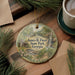 A decorative ornament featuring a scenic landscape with a waterfall, cabin, and pine trees, along with the text "James H. Floyd State Park, Georgia".