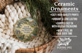 Ceramic ornaments, featuring a detailed illustration of a house and trees, are displayed in a woven basket.