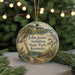 A round ornament with a scenic illustration of John James Audubon State Park, Kentucky, featuring a bird, a cabin, and a lake.