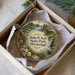 A circular ornament with a scenic image of John W. Kyle State Park, Mississippi, displayed in a box.