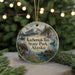 A circular ornament featuring a scenic landscape of Kachemak Bay State Park, Alaska, with a bald eagle, a bear, and a salmon in the water.