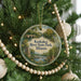 A round ornament on a Christmas tree, featuring a scenic image of Kankakee River State Park, Illinois.