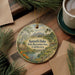 A decorative ornament featuring a scenic landscape of the Kenneth Hahn State Recreation Area in California, with a city skyline in the background.