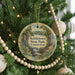 A round ornament hanging on a Christmas tree, featuring a scenic image of Kettletown State Park, Connecticut.