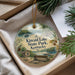A decorative ornament with a scenic image of Kincaid Lake State Park, Kentucky, hanging from a string.