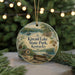 A round ornament with a scenic image of Kincaid Lake State Park, Kentucky, featuring a bench, cabin, and trees.