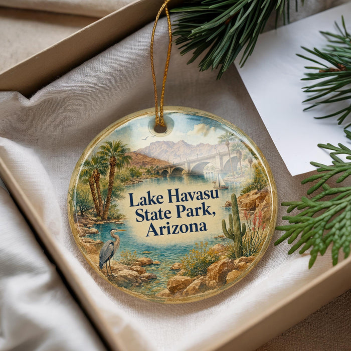 A decorative ornament with a scenic image of Lake Havasu State Park, Arizona, hanging from a string.