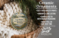 Ceramic ornaments, specifically a Lake Hudson State Recreation Area, Michigan ornament, are displayed in a basket with pine branches. The ornament is described as cozy, high-quality prints, vibrant, and long lasting, and it is shipped fast in holiday packaging. The ornament is not peeling or fading over time.