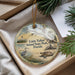 A decorative ornament with a scenic image of a bird, a lighthouse, and a turtle, along with the text "Little Talbot Island State Park, Florida".