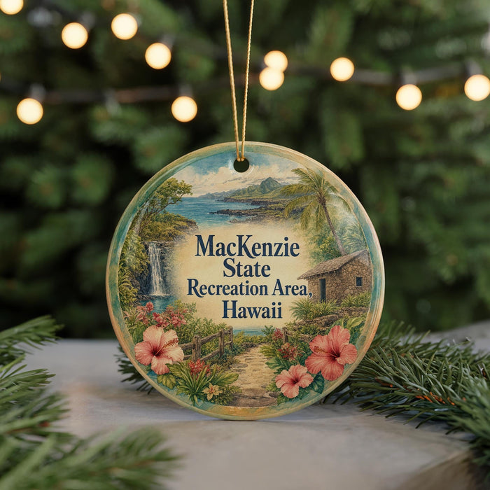 A circular ornament with a tropical landscape and hibiscus flowers, featuring the text "MacKenzie State Recreation Area, Hawaii" on it.