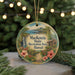 A circular ornament with a tropical landscape and hibiscus flowers, featuring the text "MacKenzie State Recreation Area, Hawaii" on it.